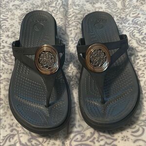 CROCS Black Sandals with Gold Accent